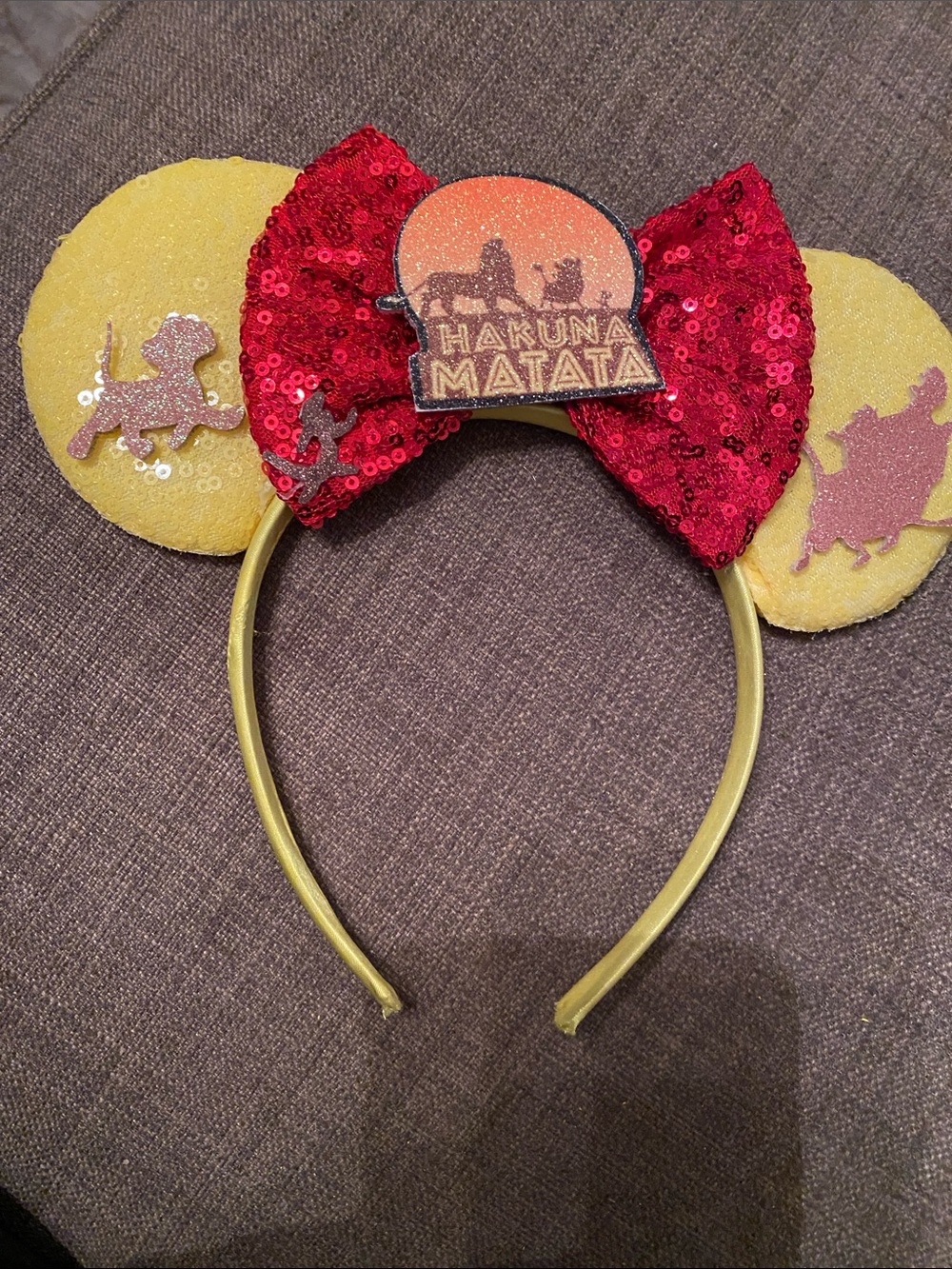 Disney Lion King Hakuna Matata Sequin Bow Ear Headband - Red & Yellow